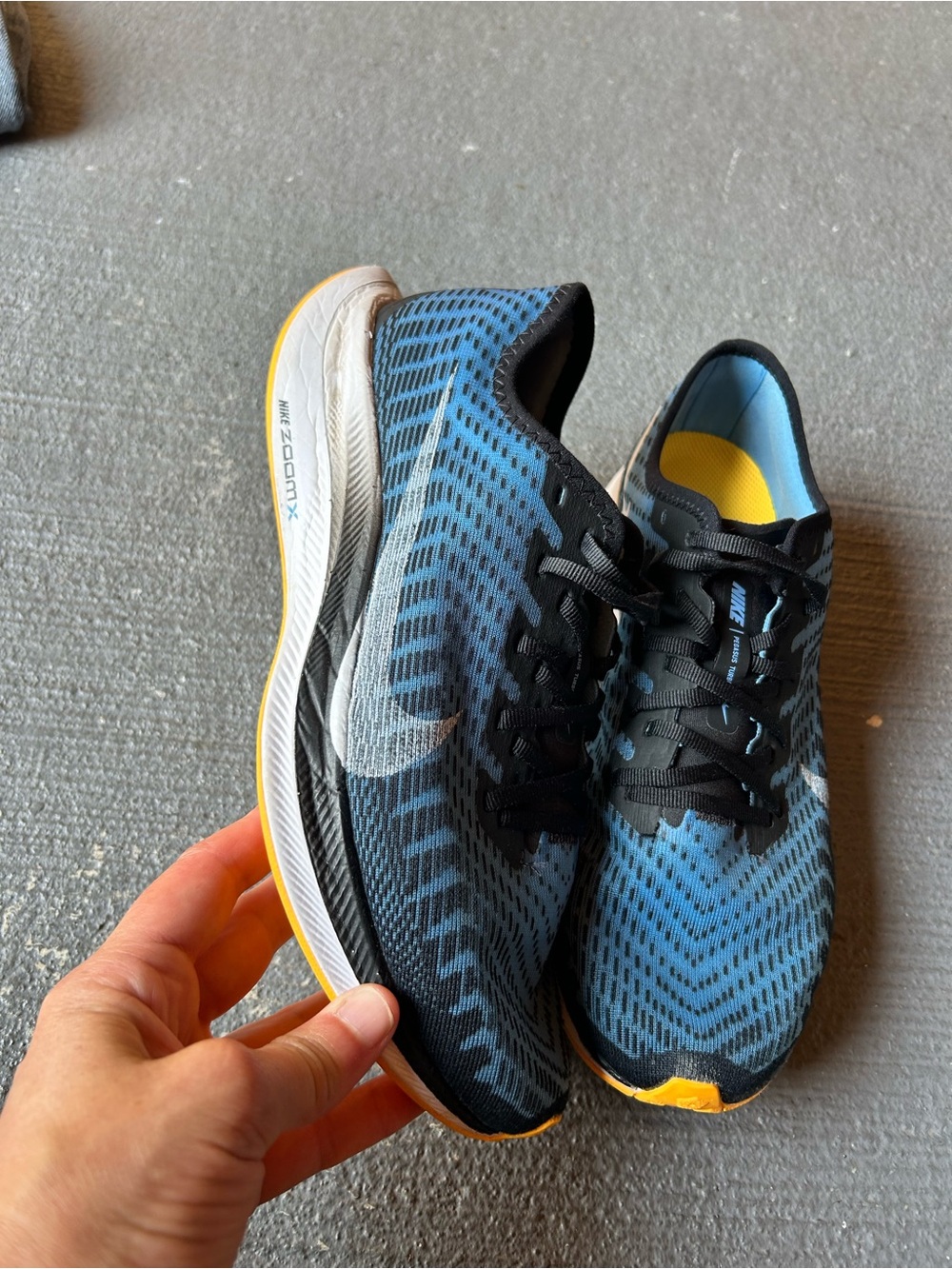 Nike Men’s Blue and Black Zoom Running Shoes with Yellow Accents